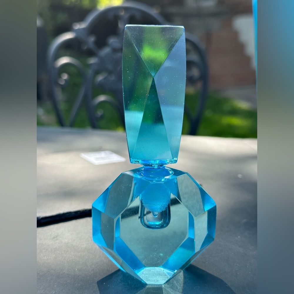 Beautiful Czech Glass Geometric Cut
Aqua blue scent bottle 5 " tall